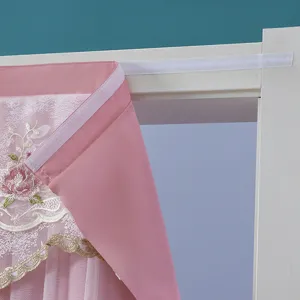 Pink lace door curtain detail close-up, punch-free velcro installation for room decor.