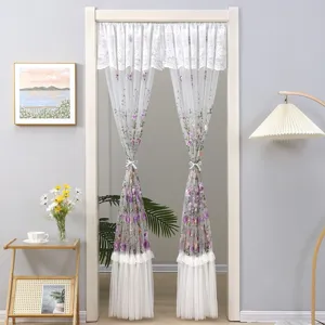 French romantic floral lace door curtain detail, elegant purple embroidery and bow tieback.