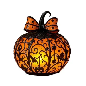 Halloween Kürbis-Laterne mit schwarzer Reben-Silhouette und Schleife