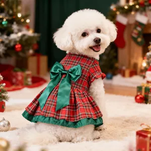 Cute Christmas plaid dog dress with a green satin bow for small pets holiday dress up.