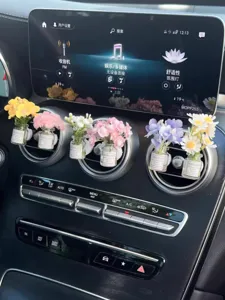 Car air vent flower perfume clip decorative aromatherapy bottle for auto interior.