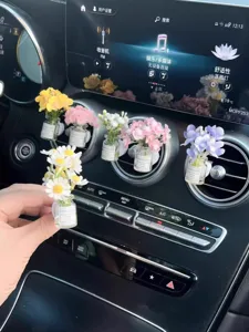 Cute baby breath flower car air vent perfume clip, fresh floral aromatherapy bottle interior decor.