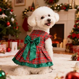Cute Christmas plaid dog dress with green bow, perfect holiday pet costume for festive photos.
