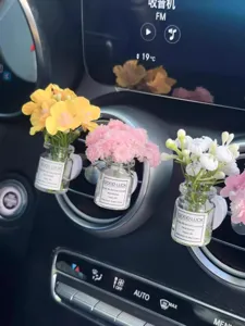 Mini glass flower car air vent clip aromatherapy bottle for fresh interior decoration.