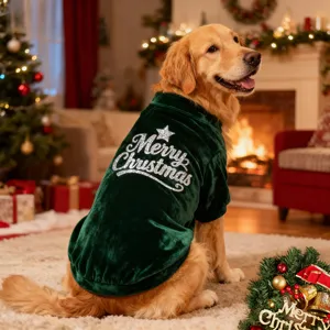 Close-up view of a dark green velvet dog coat featuring sparkly holiday text for pets.