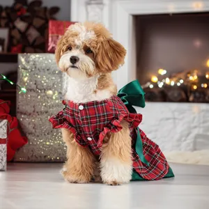 Detailed view of the pet dog Christmas plaid dress featuring festive red and green plaid.