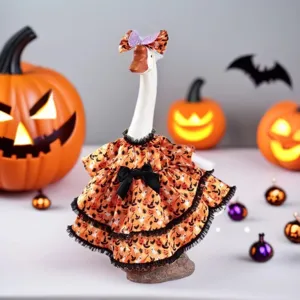 Halloween porch goose decoration with cute orange pumpkin dress and festive spooky props setup