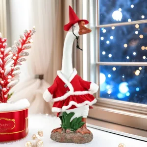 Statue de oie de Noël avec tenue de Père Noël rouge pour décoration de maison de vacances