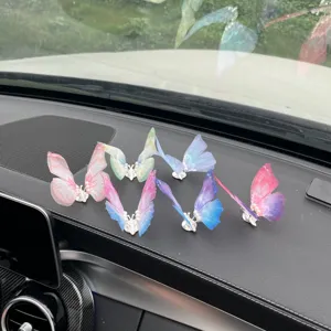 Detailed view of colorful sheer mesh butterfly car decor clips with lovely pearl details inside.