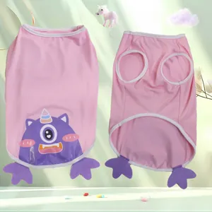 Cute pink pet vest detail showcasing breathable fabric, adorable cartoon monster graphic and soft texture.