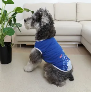 Close-up of the blue pet vest with cute monster print, comfortable spring summer dog apparel.