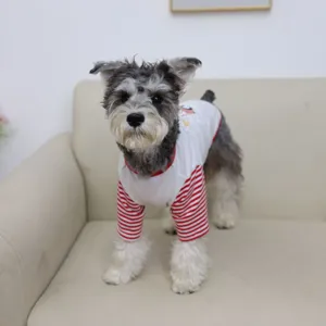 Cute cartoon dinosaur dog vest for spring and summer, breathable striped pet clothing.