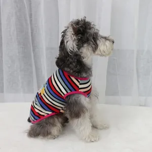 Colorful striped pet vest for dogs and cats, cute cartoon print round neck clothing.