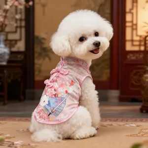 Detail view of the cute pink pet cheongsam dress featuring cherry blossoms and rabbit print.