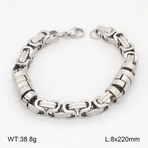 Bracelet homme en acier titane chaîne Byzantine avec charms gravés, robuste et élégant.