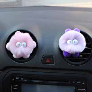 Lindo monstruo de peluche clip para salida de aire de coche decoración interior.