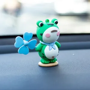 Cute lonely frog car dashboard ornament with blue windmill interior decoration accessory item