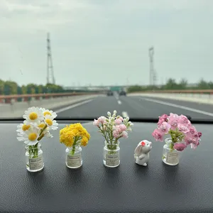 Cute car dashboard ornament mini flower vase and rabbit figurine for auto interior decor.