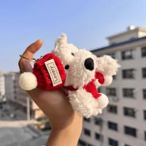 Cute West Highland white plush puppy bag pendant keychain with red knitted hat detail.