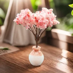 Hermoso árbol artificial de flores de cerezo rosa en jarrón de cerámica para oficina.