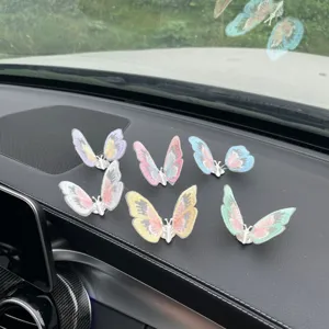 Detailed view of colorful butterfly car interior decorations displayed on a sleek dashboard.