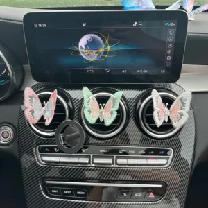 Detailed view of creative butterfly car air vent aromatherapy clip decorative accessory.