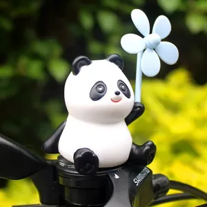 Cute panda bicycle handlebar decoration with blue windmill propeller for electric bike.