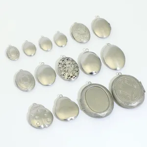 Assortiment de pendentifs médaillons en acier inoxydable vintage ovales creux photo