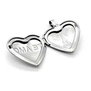 Pendentif médaillon cœur en acier inoxydable, tour Eiffel gravée et inscription.