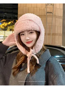 Bonnet trappeur en peluche d'hiver de couleur unie avec cache-oreilles pour le froid.