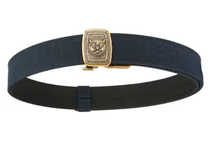 Close-up of a double-layer hardened IPSC tactical nylon belt featuring a gold eagle buckle