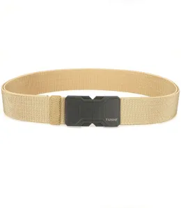 Detailed view of black magnetic buckle on tan woven tactical elastic belt for men
