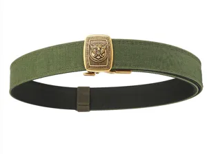 Close-up detail of olive green tactical nylon belt featuring an eagle emblem metal buckle