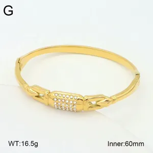 Détail de bracelet jonc cadenas strass acier inoxydable, vue fermoir bracelet ouvert doré.