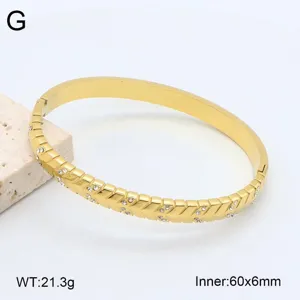 Bracelet jonc rigide en acier inoxydable doré avec strass motif chevron femme