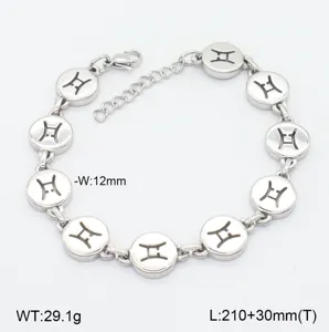 Bracelet en acier inoxydable avec pendentifs ronds des 12 signes du zodiaque et fermoir.