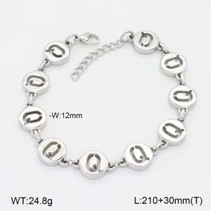 Bracelet en acier inoxydable avec charm lettre ronde creuse et chaîne d'extension.