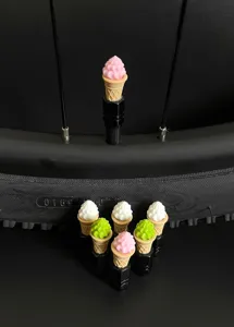 Cute ice cream cone bicycle valve caps, tire stem dust covers for mountain and road bikes.