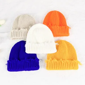 Bunte Strickmützen mit Fransen für Damen im Herbst und Winter, warme Freizeitmützen.