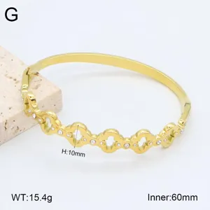 Vue détaillée du bracelet jonc en acier inoxydable avec motif trèfle et dimensions.