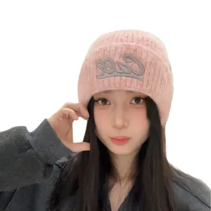 Korean style pink knitted beanie hat with stylish cool embroidery for autumn and winter warmth.