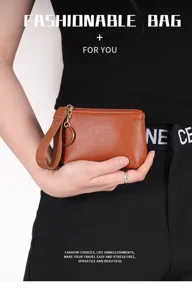 Brown lychee texture coin purse detail, portable mini clutch with strap and metal zipper.