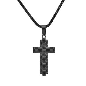 Close-up of a masculine black stainless steel cross pendant necklace with texture