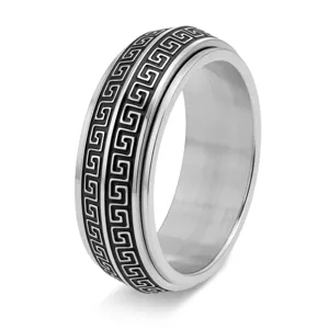Close-up detail of men's stainless steel spinner ring with Greek key pattern
