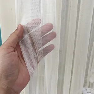 Detailed view of white mesh door curtain fabric, breathable texture and light transmission.