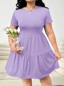 Solid color short sleeve tiered mini dress, casual fashion summer wear detailed view.