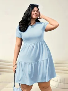 Casual plus size short sleeve tiered dress, solid color design with comfortable fit detail.