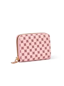 Pink compact zip wallet with elegant clover diamond lattice pattern and gold zipper hardware.