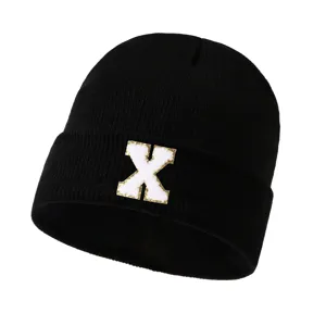 Black fashion letter X patch beanie hat for men and women, warm winter knitted cap.