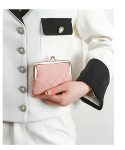 Pink kiss-lock coin purse, retro metallic frame wallet with clover pattern, compact card holder.